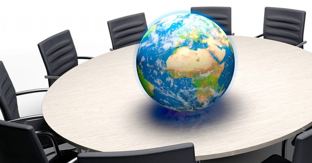 A Globe on a Meeting Table